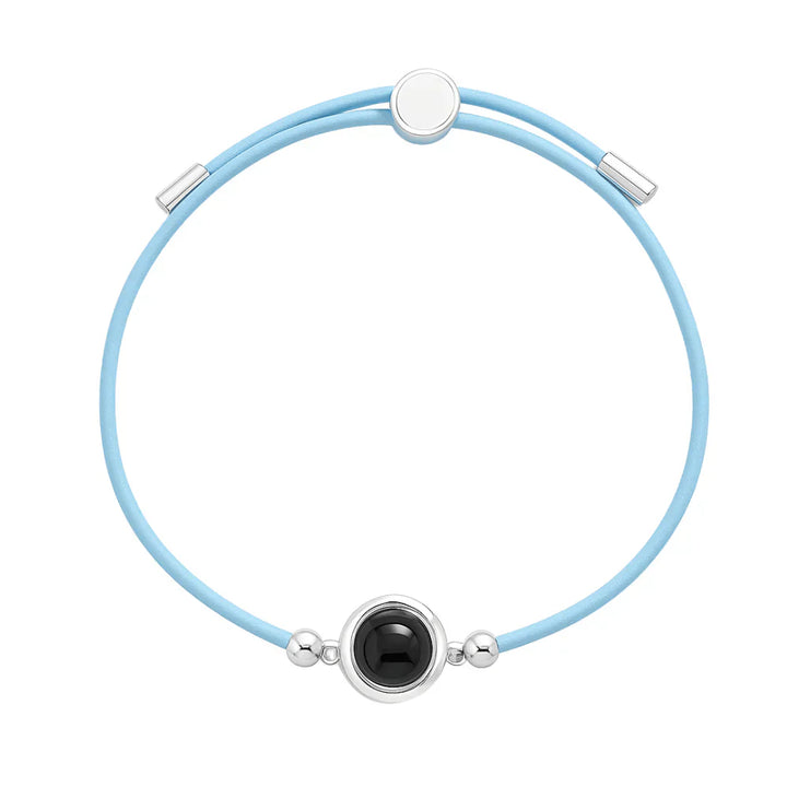 Personalized photo bracelet with a leather cord