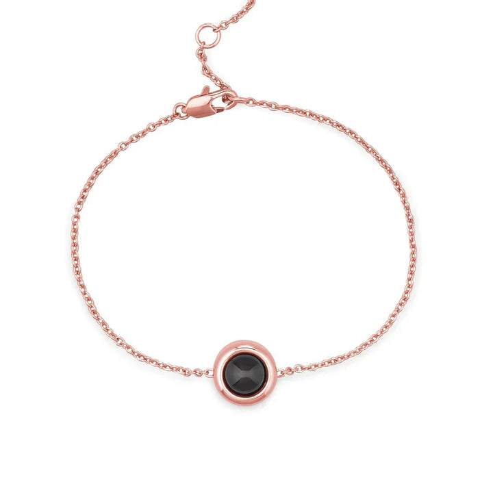 Personalized photo bracelet with a cable chain.