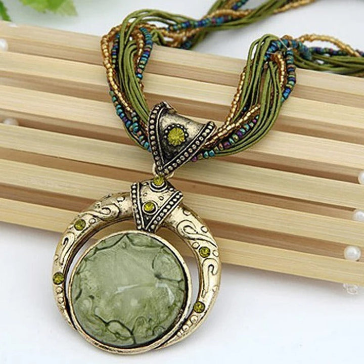 Vintage necklace with ethnic green crystal pendant