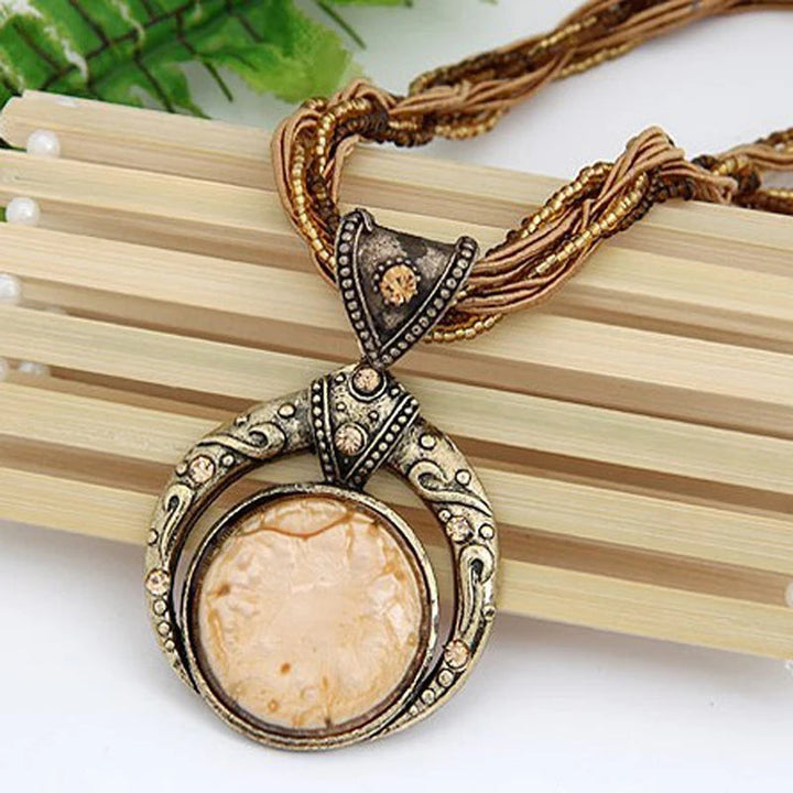 Vintage necklace with ethnic green crystal pendant