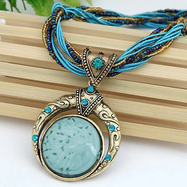 Vintage necklace with ethnic green crystal pendant